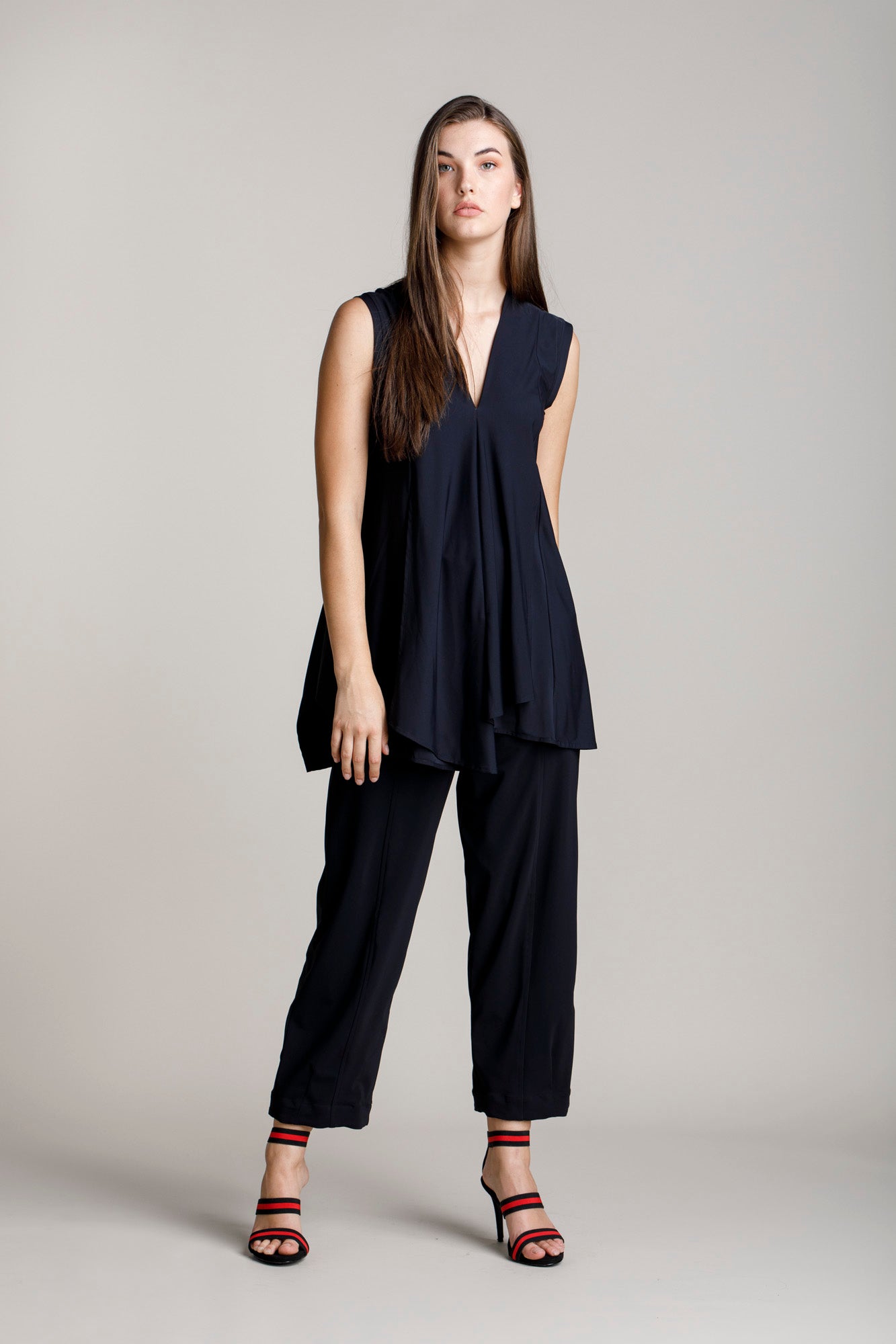 Black jersey hip pocket pant with a wide leg and cropped length, Australian made